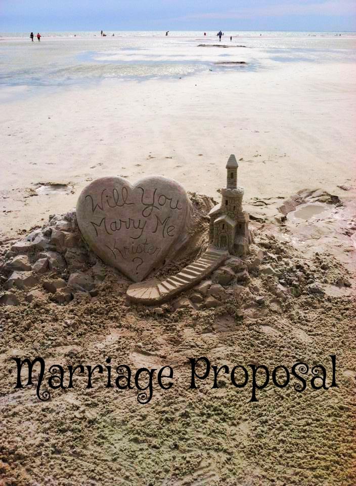 Marriage proposal sand castle